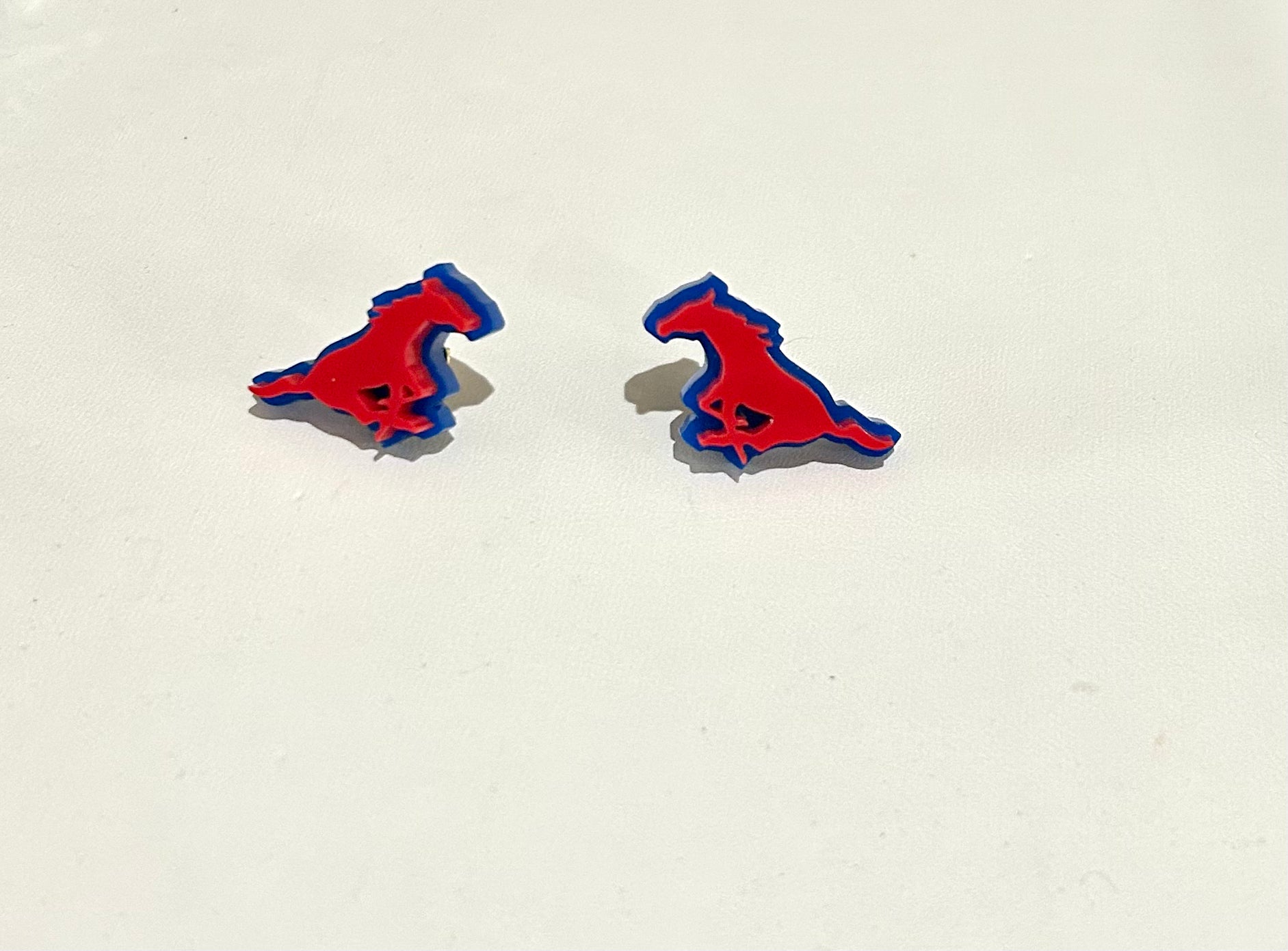 Mini Mustang Red studs on Blue Acrylic